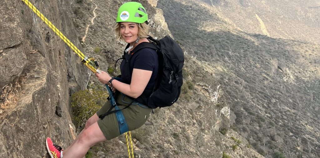 Guided abseiling experience in Jabal Samhan, Salalah Oman – cliff adventure with panoramic mountain views in Dhofar