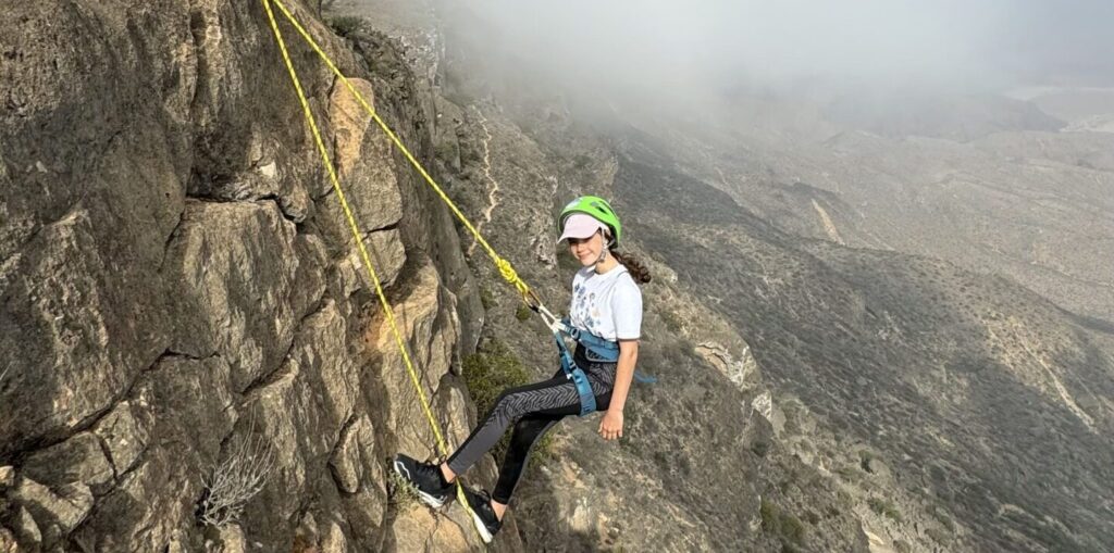 Mountain abseiling adventure in Jabal Samhan, Salalah Oman – dramatic cliff descent in Dhofar