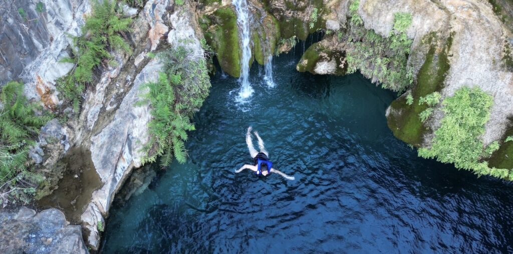 Crystal clear waterfall pool swimming experience in Salalah Oman – hiking and adventure tours