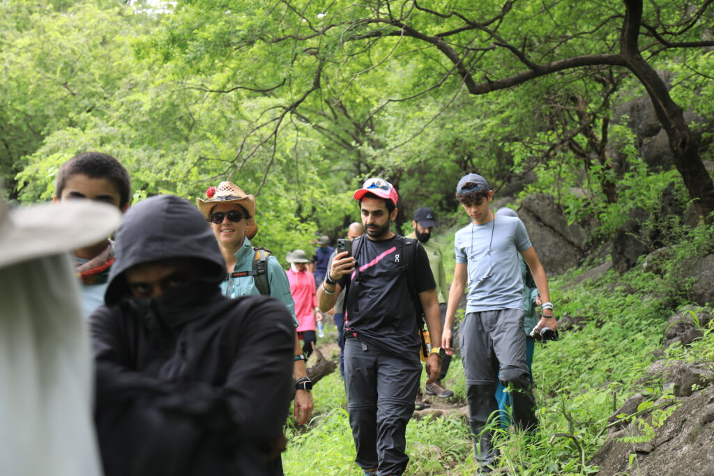 Group hiking in Salalah Oman green nature trail adventure tour